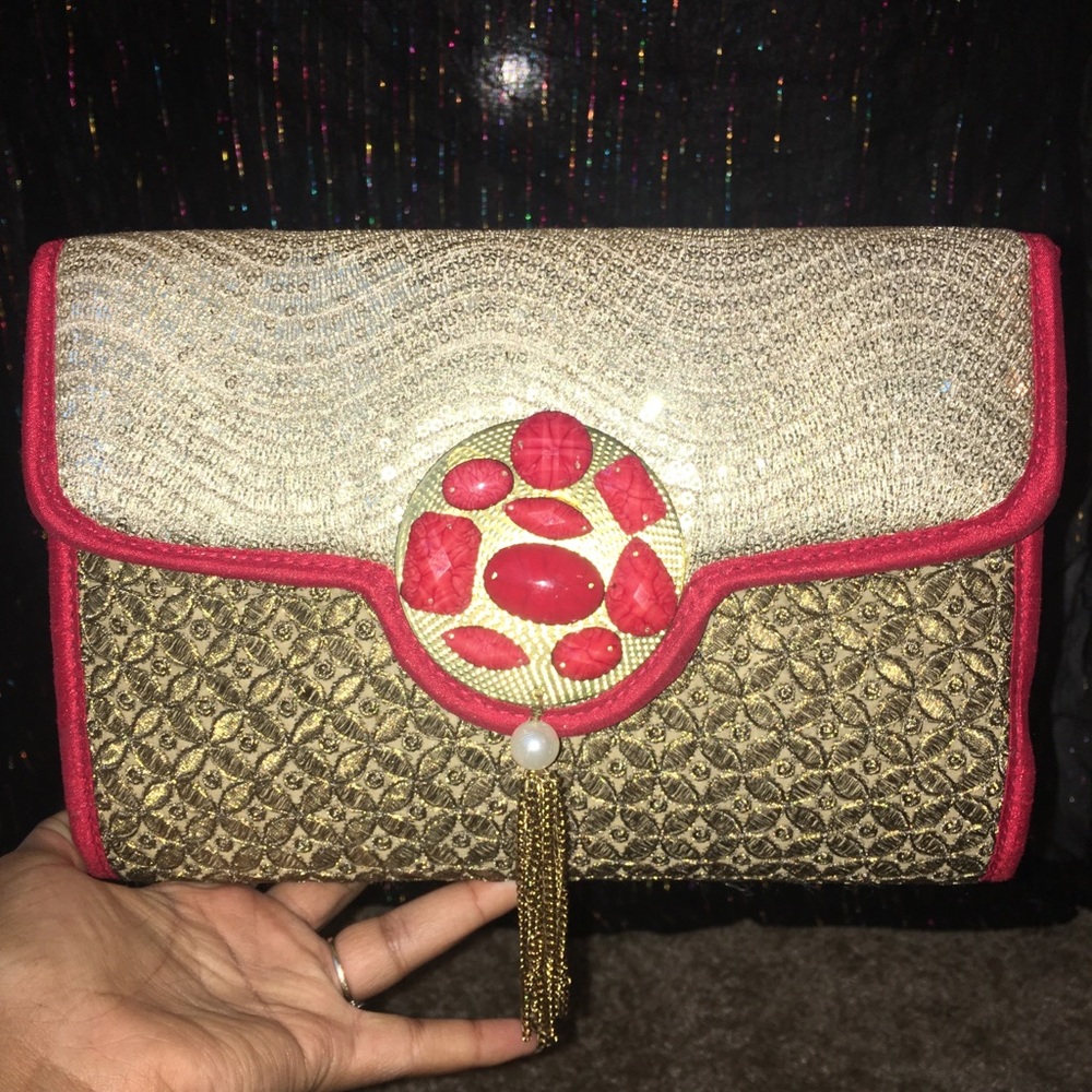 Golden and red clutch.